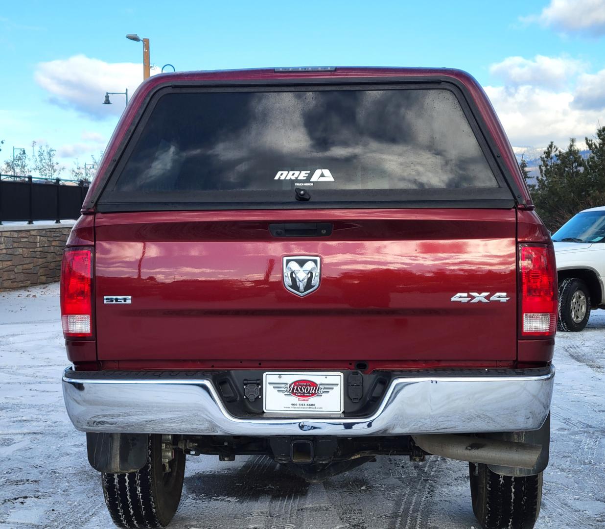 2018 Maroon /Black RAM 2500 SLT (3C6UR5DL4JG) with an 6.7 L Cummins Turbo Diesel engine, 6-Speed Automatic transmission, located at 450 N Russell, Missoula, MT, 59801, (406) 543-6600, 46.874496, -114.017433 - Only 12,839 Miles. Mint Condition/ 4 Wheel Drive. 6.7L Cummins Turbo Diesel. 6 Speed Automatic Transmission. Matching Topper. Touchscreen Display. AM FM Bluetooth. Power Drivers Seat. Air. Cruise. Tilt. Power Windows and Locks. Backup Camera. - Photo#6